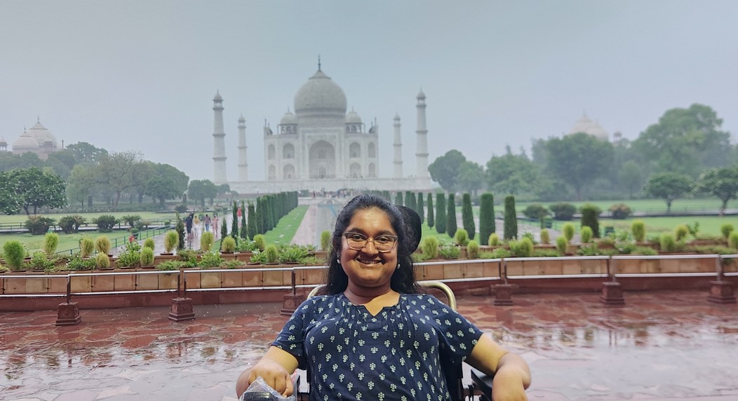 Wheelchair user traveling on metro